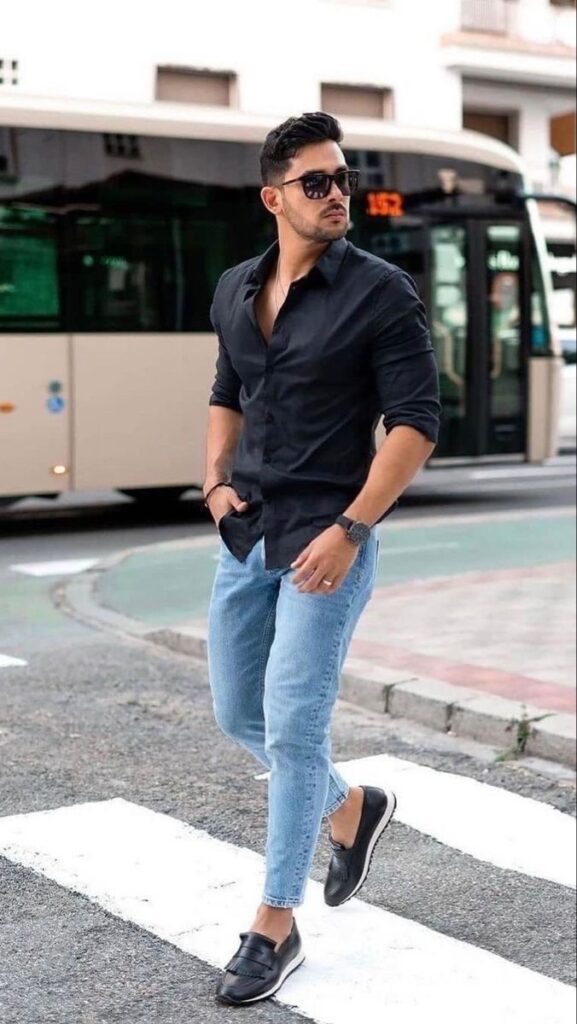 Black shirt and blue jeans combination for men